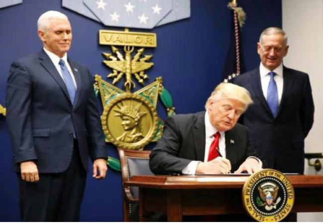 Trump Signs Order to Vet  Refugees, Citing Terrorist Threats 